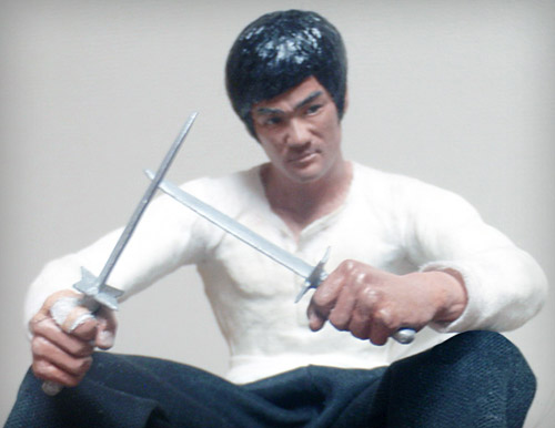 Bruce Lee as Cheng Chao-An in The Big Boss clutching two short knives statue by Marten Go aka MGO