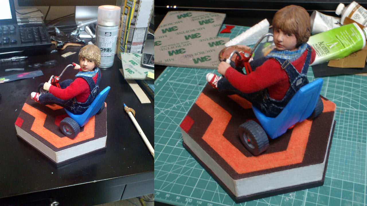 Two images side by side of Danny Torrance statue near completion on base