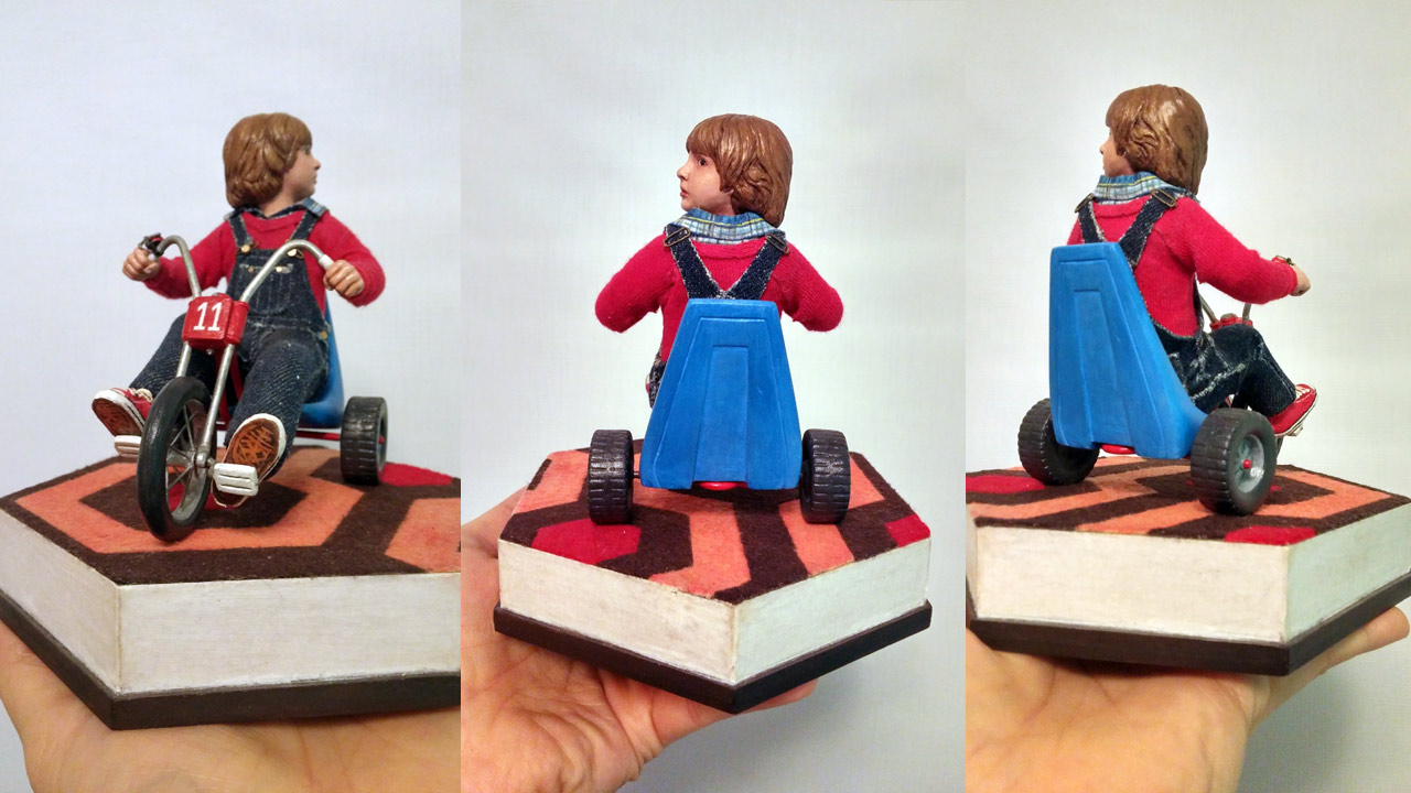Three images of miniature statue side by side by side on base in various angles