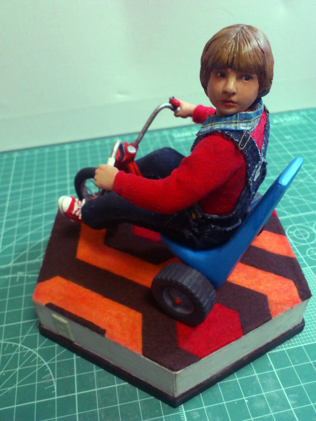 One image of complete Danny Torrance miniature statue on base completed