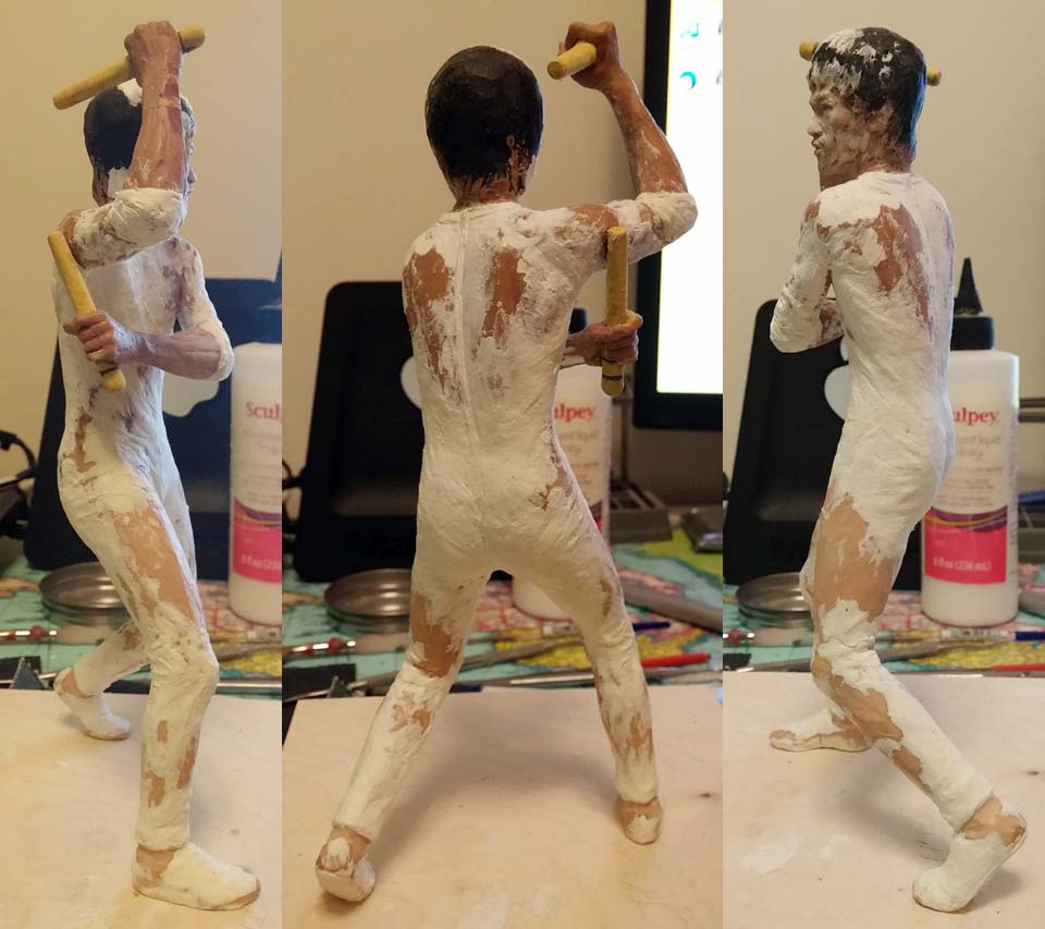 Various angles of Hai Tien statue from The Game of Death on desk