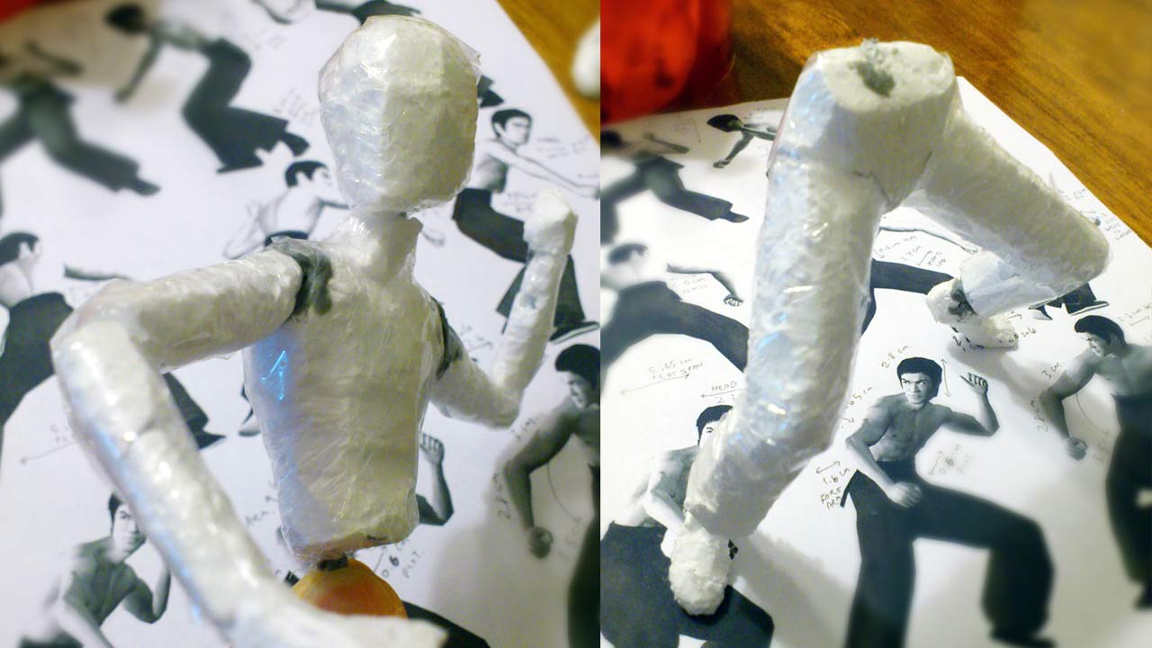 Two images side by side in close up of half body coated in styrofoam posing wrapped in saran wrap and standing legs without torso also wrapped in plastic