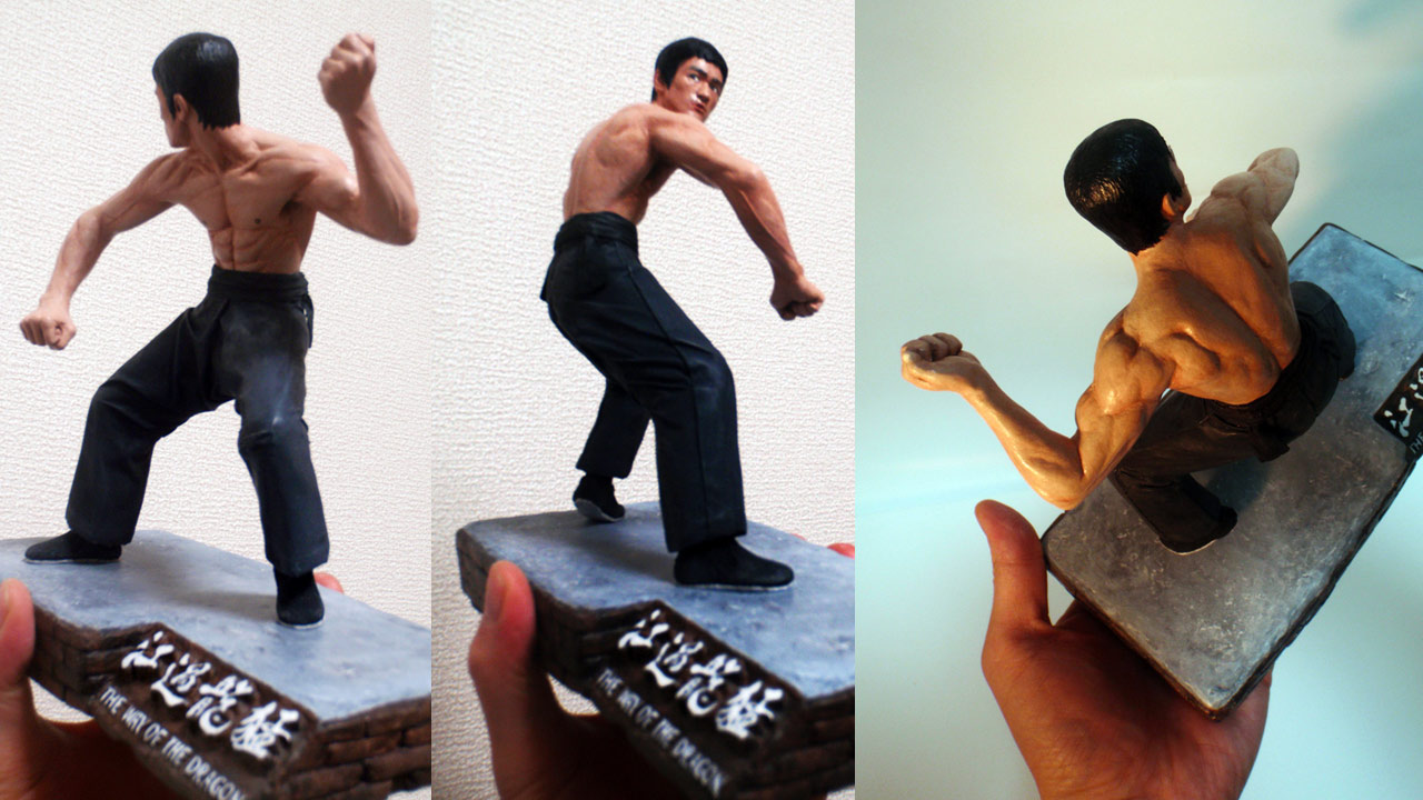 Three images in full body shots of the completed miniature statue of Tang Lung in various angles standing on base