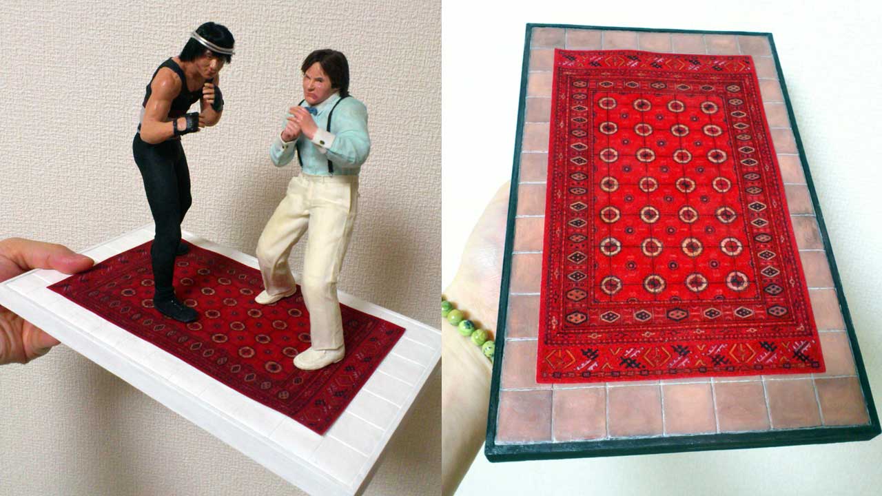 Two images side by side showing the miniature Afghani rug in a mid pattern inking progress and metal base with Thomas and Mondale's Henchman statues standing on it.